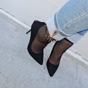 Black netted stiletto heels